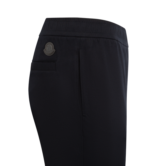 Image 3 of 3 - NAVY - MONCLER Leather Logo Cotton Blend Sweatpants featuring cotton and nylon blend double jersey, waistband with drawstring fastening, side and back pockets and leather logo details. 90% cotton, 10% polyamide/nylon. Made in Italy.