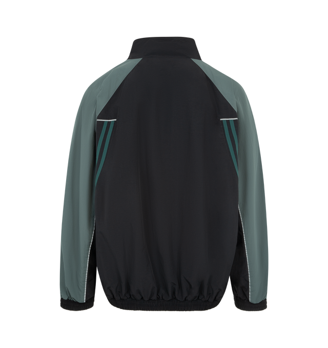 Image 2 of 4 - BLACK - MARTINE ROSE Paneled Nylon Track Jacket with Graphic T-Shirt Lining featuring nylon track jacket prelayered with a peekaboo cotton T-shirt, front zip closure, stand collar, front welt pockets and lined. 100% nylon, with 100% cotton contrast. 