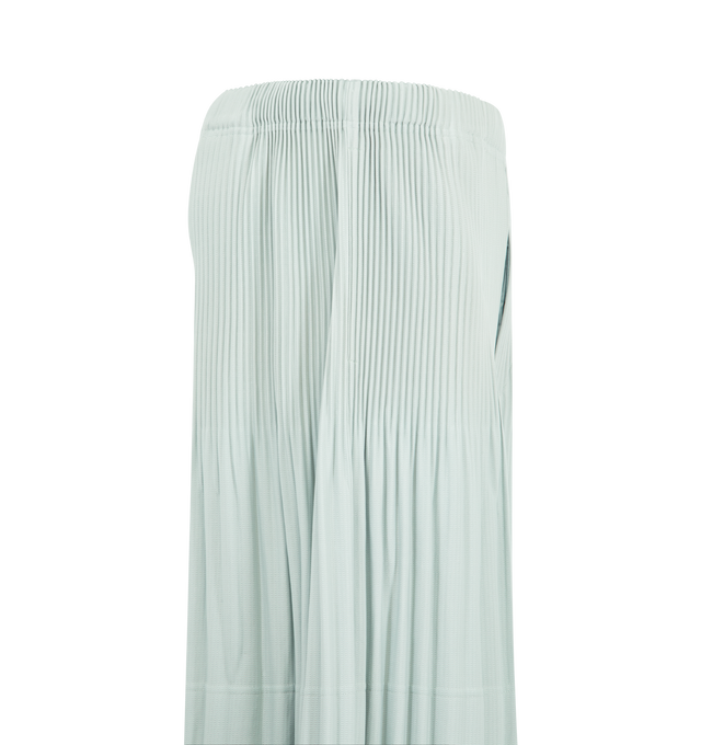 Image 3 of 3 - GREEN - Issey Miyake Men's shorts designed for portability and lightweight comfort, with the quick-drying properties unique to polyester. Featuring elastic drawstring waist, pockets on both sides and button-fly design. 100% Polyester. Made In Japan.