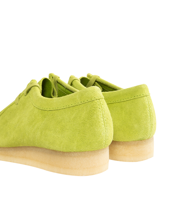 Image 3 of 4 - GREEN - CLARKS Wallabee Shoes featuring suede upper, moccasin construction, hand-stitched apron seams, lace closure, natural pebble crepe sole, branded fobs and embossed branding. 