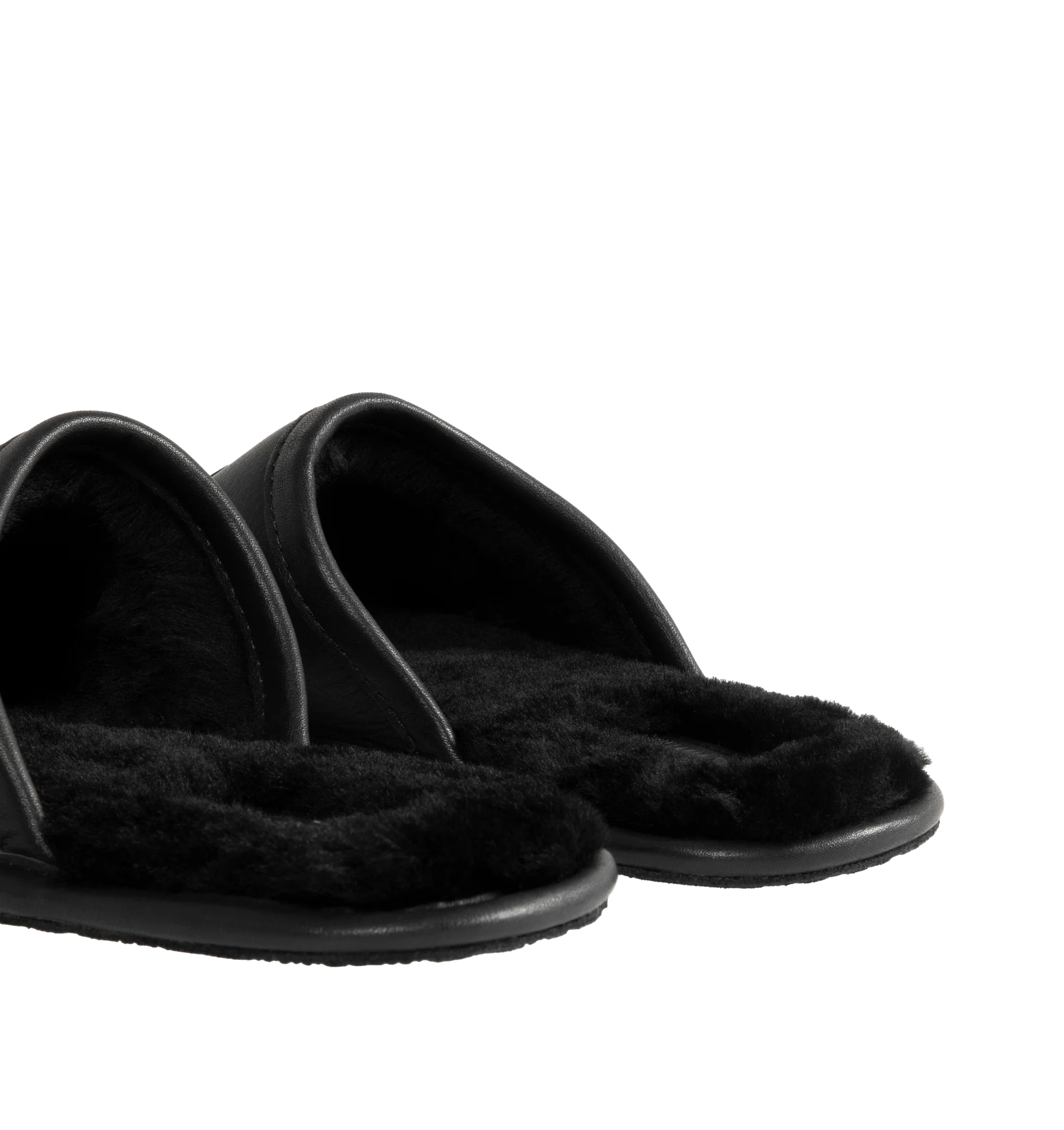Image 3 of 4 - BLACK - UGG x Willy Chavarria Leather Hotel Slippers are crafted from black leather and feature a luxury reinterpretation of the classic hotel slipper silhouette. Designed with Chavarria's crest embroidered, and lined with UGG's signature plush sheepskin for exceptional comfort. Main Material: Leather. Lining: Sheepskin. Unisex style in men's sizes.