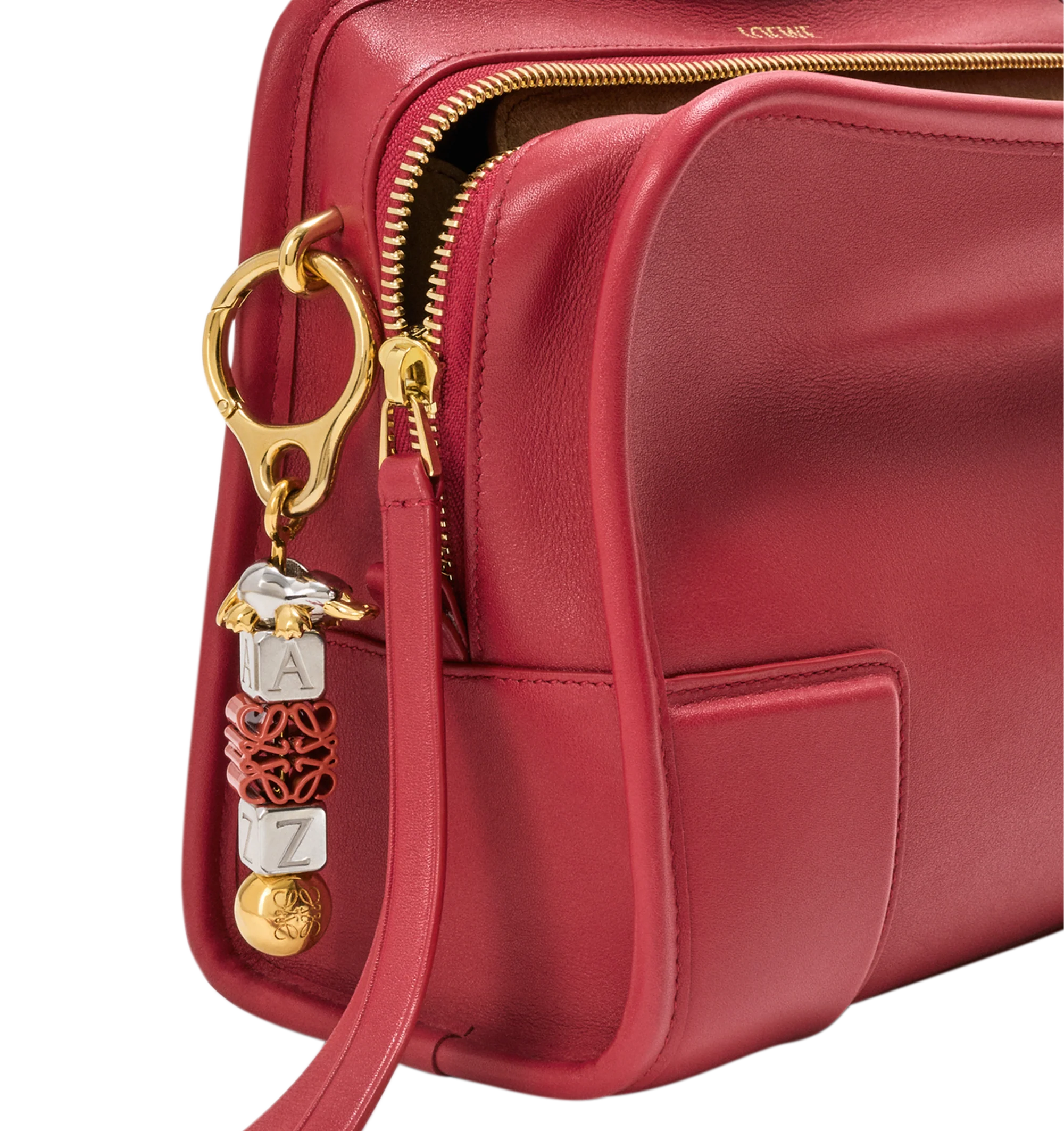 Image 17 of 18 - RED - Loewe Small Amazona 180 Bag in leather features a relaxed silhouette anchored by a single toron top handle, designed to be carried open, while a concealed closure secures the main compartment, three carry options: short handle, removable shoulder strap and crossbody, zip closure with two leather zip pullers, two compartments, main compartment closed with magnetic closure, internal flat pocket, left side d-ring for customization, nappa lambskin lining, and embossed double L branding. L 