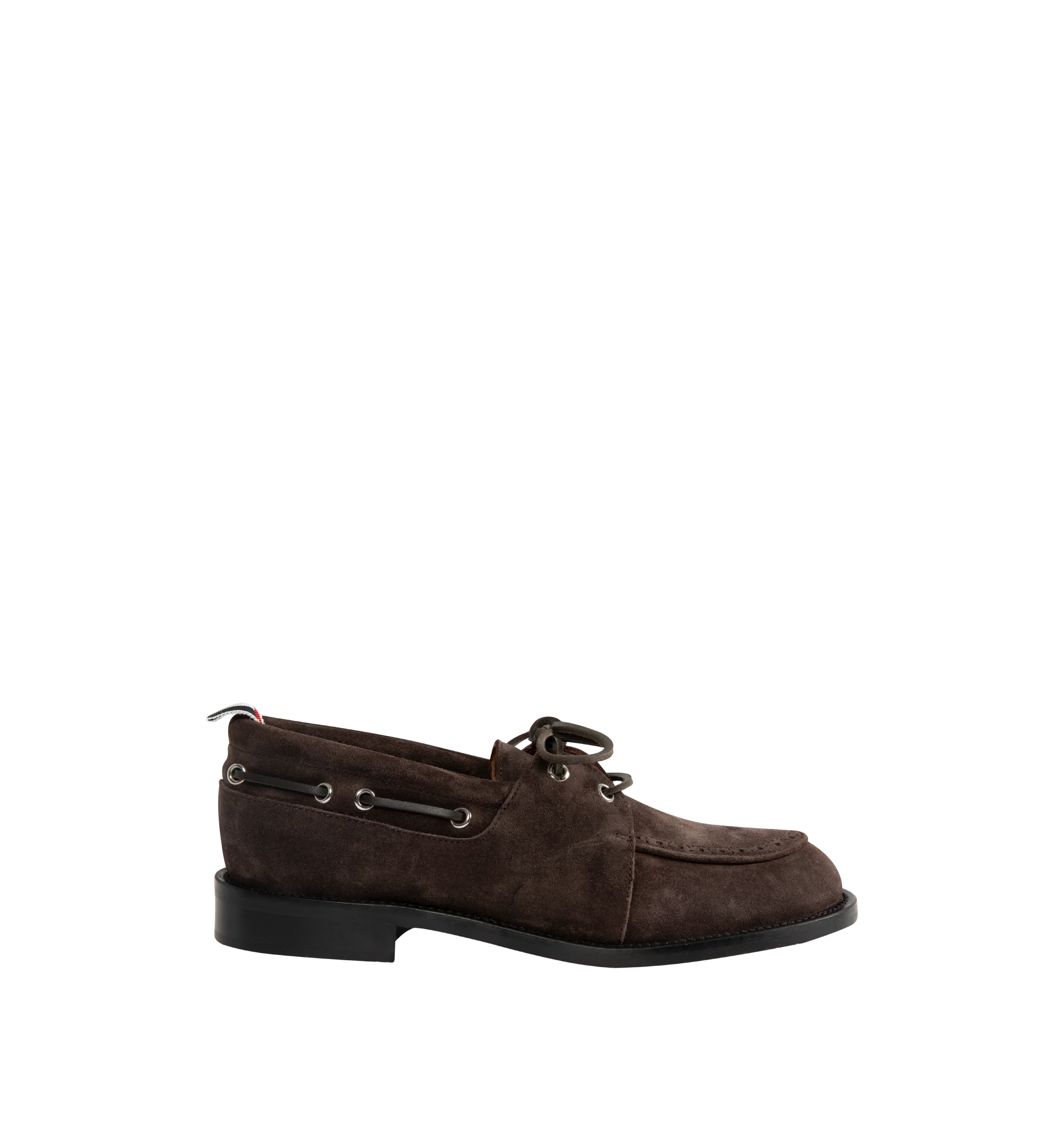 Image 1 of 4 - BROWN - Thom Browne Mens Boat Shoes are crafted from supple calf suede. Feature a lace-up closure, classic boat shoe silhouette, brogue detailing, rubber sole, and signature striped grosgrain loop tab. Main Material: Upper: 100% Calf Suede Leather; Lining: 100% Calf Leather; Sole: 100% Rubber. Made in Italy.