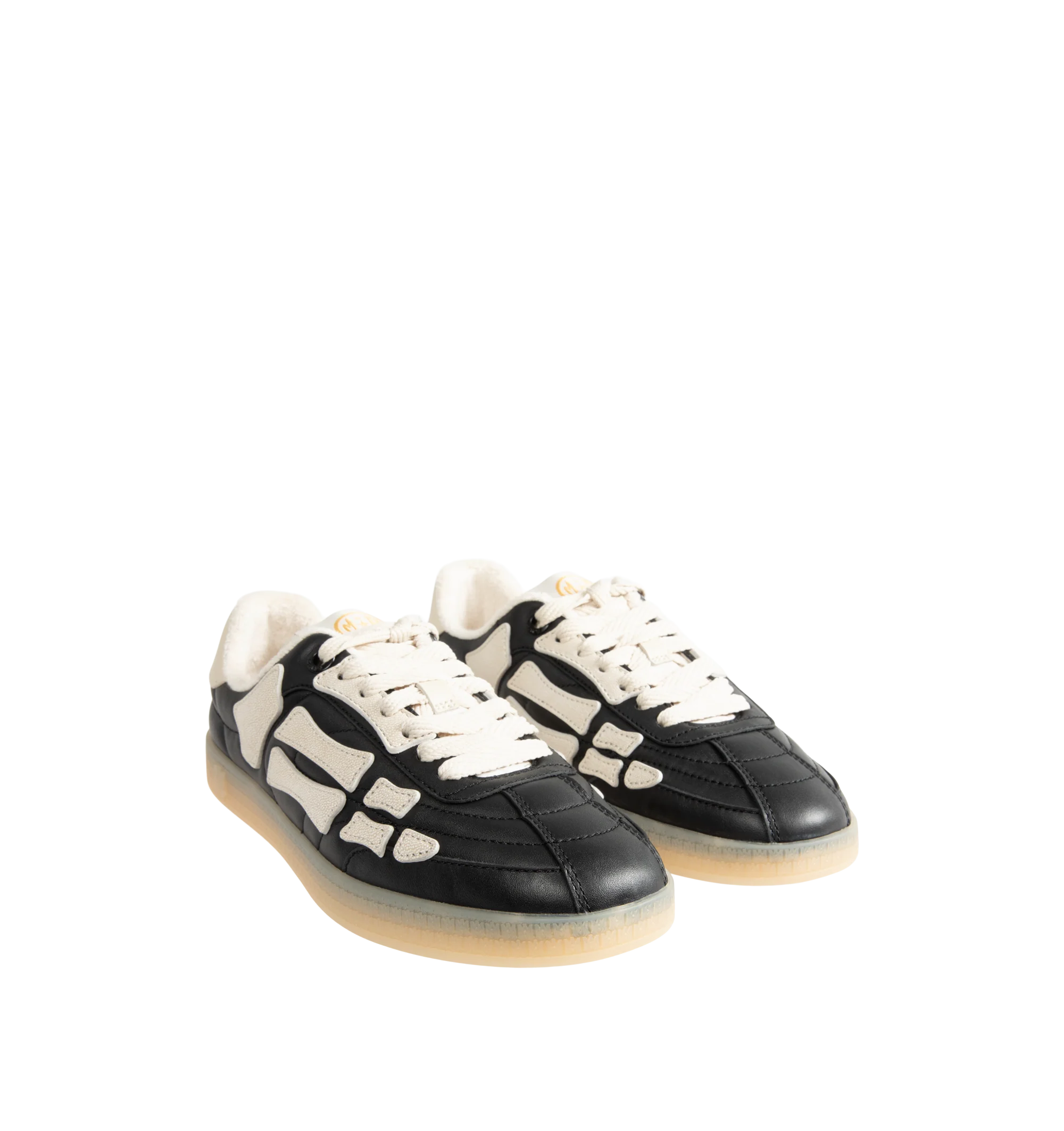 Image 2 of 5 - BLACK - Amiri Mens Pacific Football Sneakers are crafted with a leather upper and signature pebbled leather bone appliqus. Feature contrast topstitching, lace-up closure, padded collar, two-tone rubber sole, and low-top silhouette. Main Material: Leather Upper; Sole: Rubber. Made in Vietnam.