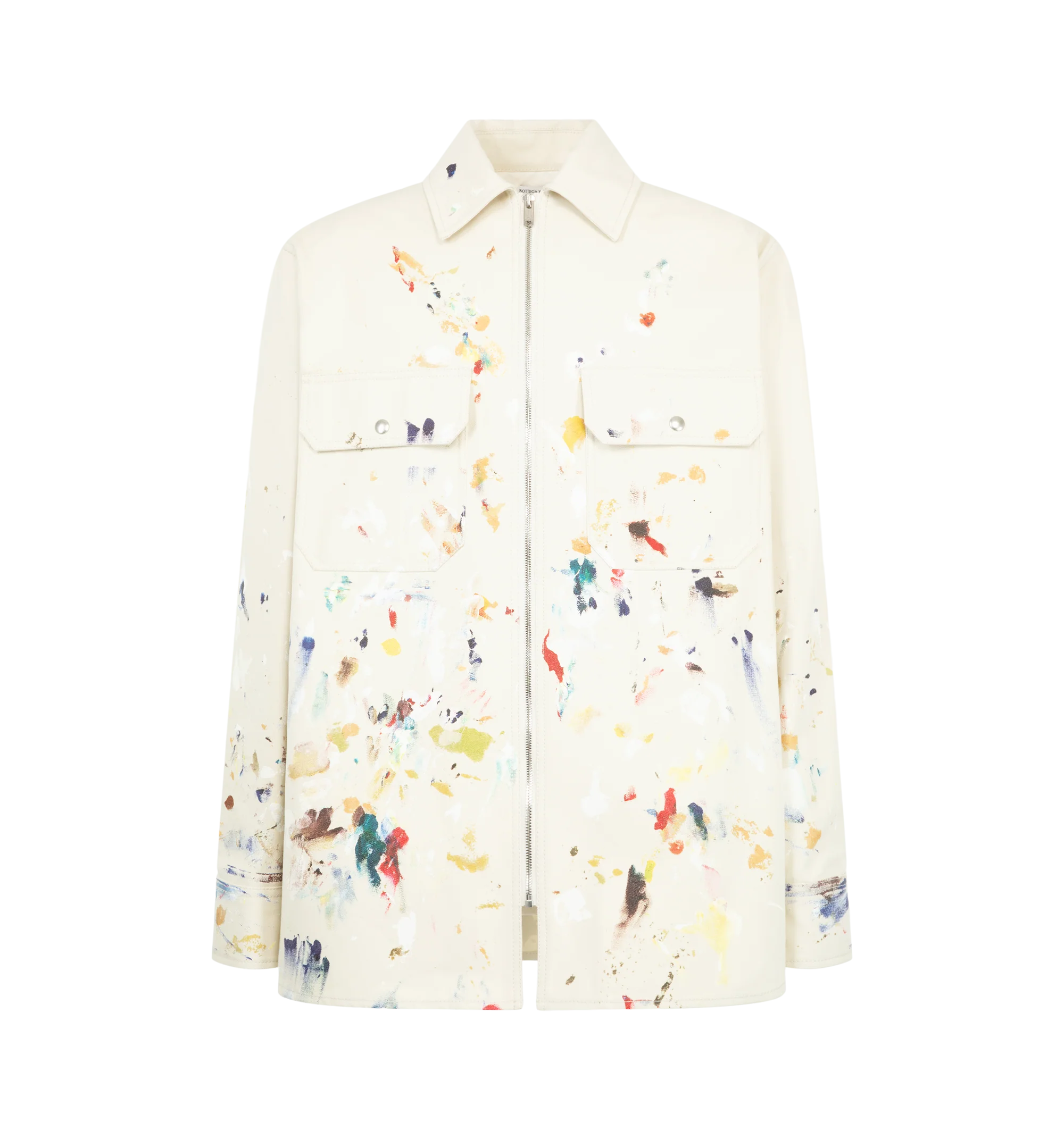 Image 1 of 3 - NEUTRAL - Bottega Veneta Men's Paint Splatter Shirt Jacket is crafted from 100% cotton canvas material and features an allover paint splatter motif inspired by an artists studio aesthetic. Designed with a point collar, front zip closure, long sleeves, and flap chest pockets. Main Material: 100% Cotton. Closure: Front Zip. Collar: Point Collar. Pockets: Front Flap Pockets. Made in Italy.