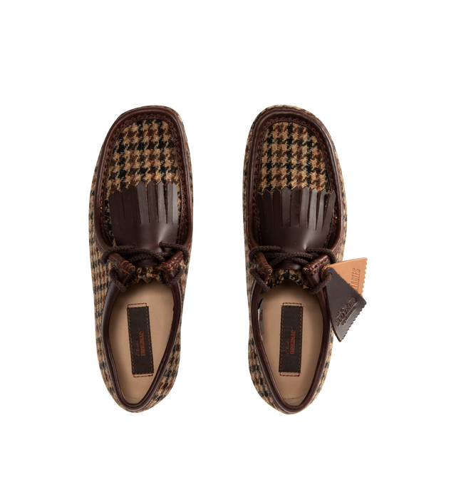 Image 4 of 4 - BROWN - CLARKS Wallabee Shoe featuring Harris Tweed upper, leather collar, apron binding, moccasin construction, brown round waxed lace with tassel aglets, Clarks Originals Leather and 200 years FOBS, Harris Tweed woven label inside quarter, Clarks Originals woven sock label and crepe rubber outsole.