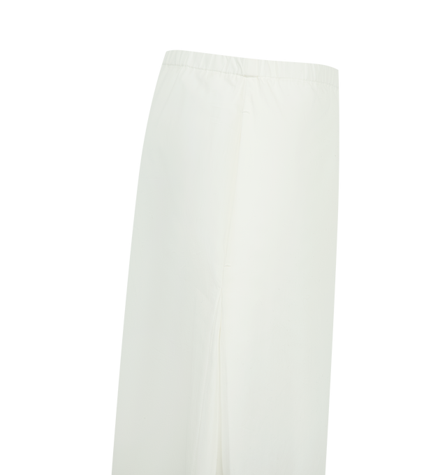 Image 3 of 3 - WHITE - KHAITE Roma Pant featuring a pull-on pant in crisp, lightweight cotton poplin, relaxed, round-leg silhouette, cropped to hit high on the ankle, pleats positioned just below the in-seam side pockets and elasticated waist. 100% cotton. 