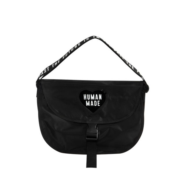 Image 3 of 4 - BLACK - HUMAN MADE Shoulder Bag featuring shoulder bag with a buckle belt, lightweight and durable nylon Oxford fabric, PVC heart logo on the front, shoulder strap with logo, zip pocket on the back, two pockets provide storage for small items and A4-sized storage. 100% nylon.