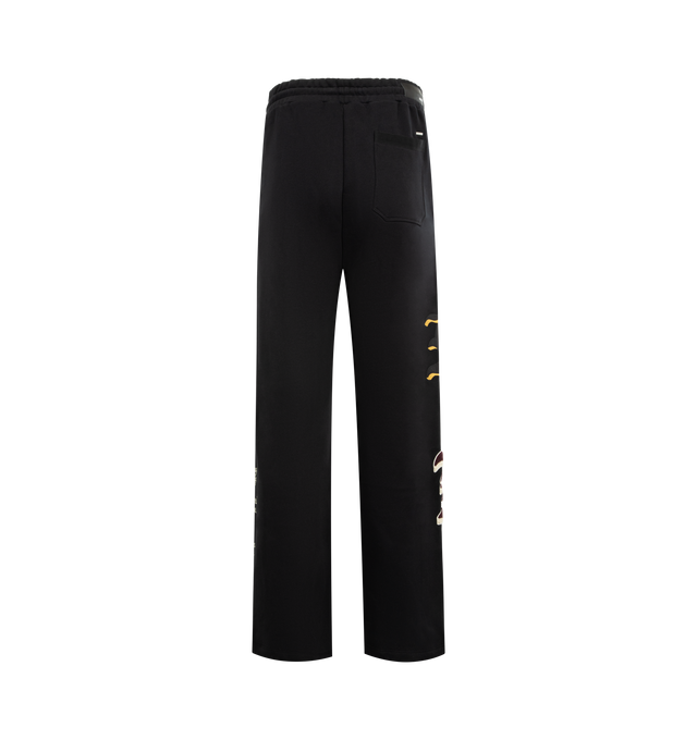 Image 2 of 5 - BLACK - AMIRI Varsity Patch Sweatpant featuring multicoloured appliqus, elasticated waistband with drawstring, relaxed fit, side pockets and back welt pocket. 100% cotton. 