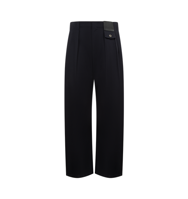 Image 1 of 5 - NAVY - LOEWE Trousers in medium-weight cavalry twill featuring pleats at the front, relaxed fit, regular length, mid waist, straight leg, concealed zip fly, buttoned coin pocket, seam pockets, rear patch pocket and LOEWE embossed leather patch placed at the front. Wool. Made in Italy.