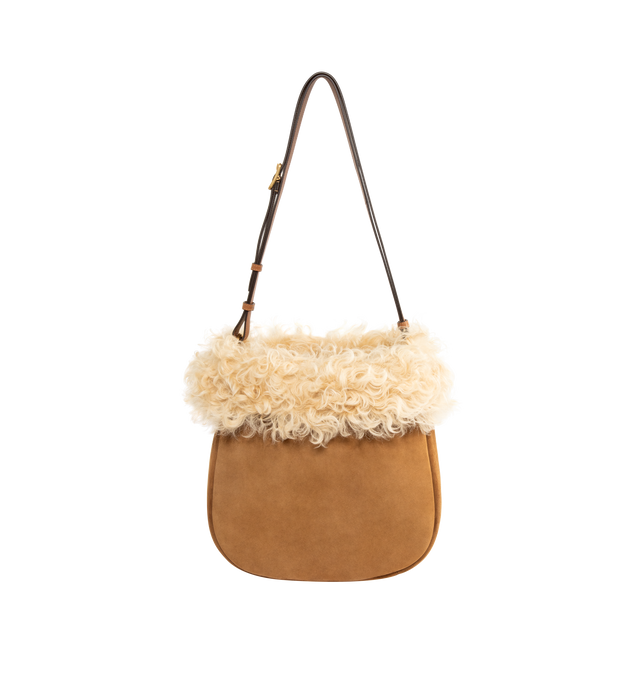 Image 1 of 3 - BROWN - SAINT LAURENT Roady Shoulder Bag featuring suede exterior and lining with dyed shearling trim, magnetic snap closure at the top, one main compartment with one zip pocket and two interior slip pockets. 13" W x 11.8" H x 3.9" D. Made in Italy.