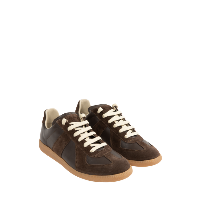 Image 2 of 5 - BROWN - Maison Margiela High Quality Luxury Sneakers featuring lace-up sneakers in buffed nappa calfskin and calfskin suede, contrasting sole, Maison Margiela logo label on the tab, internal High Quality Luxury label, internal elastic and all-over Maison Margiela logo insole. 100% calf leather. Sole: 100% rubber. Made in Italy.