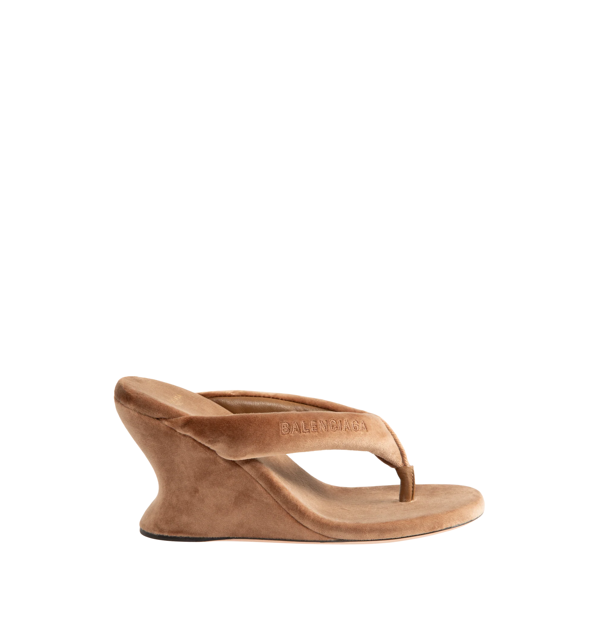 Image 1 of 4 - BROWN - Balenciaga Womens Gaeta Wedge Thong Sandals are crafted from a plush stretch velvet material. Feature a round toe, padded thong strap, slip-on design, 90mm arch wedge heel, and leather sole. Upper: cotton, viscose, elastane, Sole: calfskin, Insole: cotton, viscose, elastane. Made in Italy.