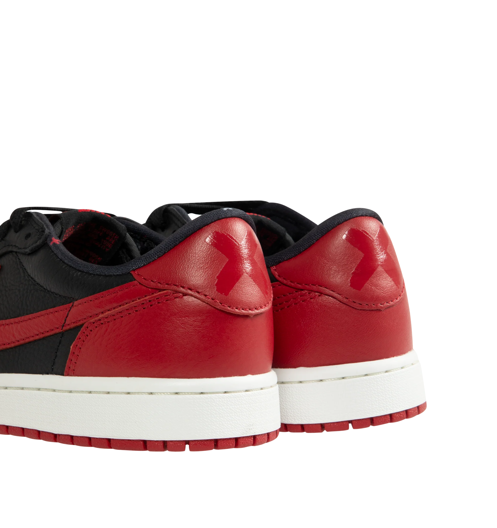 Image 3 of 5 - MULTI - Men's Air Jordan 1 Retro Low OG Sneakers feature a smooth leather upper with the iconic low-top silhouette and signature X graphics on the heel, honoring one of the most legendary colorways in Jordan history. These lifestyle sneakers combine encapsulated Air-Sole cushioning, a responsive foam midsole, and a durable rubber outsole for lightweight comfort, lasting support, and reliable everyday traction. Main Material: Leather. Midsole: Foam with Encapsulated Air-Sole Unit. Sole: Rubber 