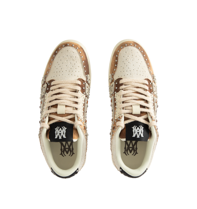 Image 5 of 5 - BROWN - AMIRI Stud Skel Top Low Sneaker featuring bone appliques, stud detailing, two-tone rubber sole with an upper paneled with washed denim and textured suede. 95% cotton, 5% polyester. Sole: rubber. 