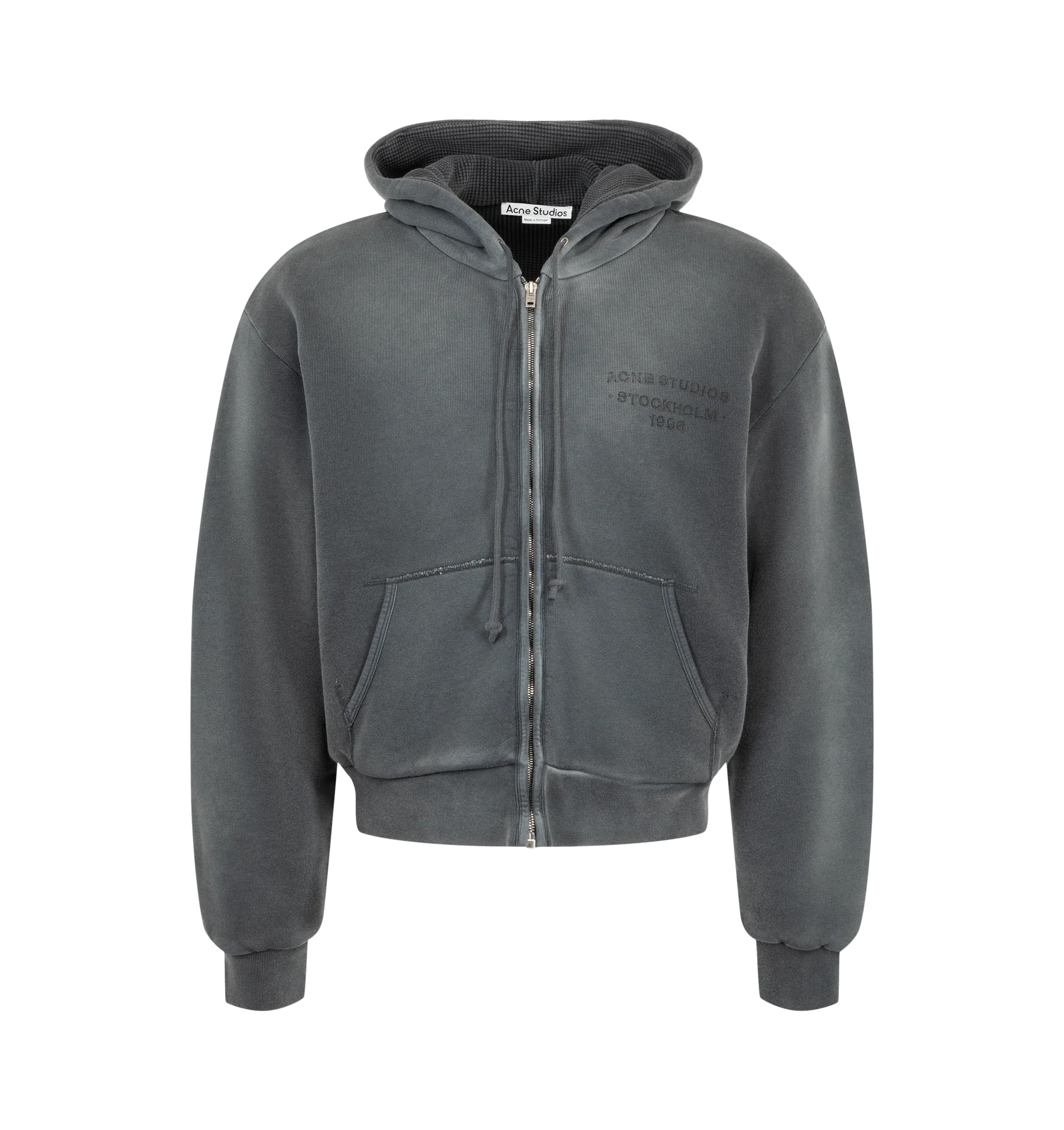 Image 1 of 2 - GREY - Acne Studios Hooded Sweatshirt featuring sprayed cotton fleece, regular unisex fit, waist-length, long sleeves, zip-up front, drawcord hood, ribbed cuffs and hem, kangaroo pockets and Acne Studios 1996 logo stamp on chest. 100% cotton.
