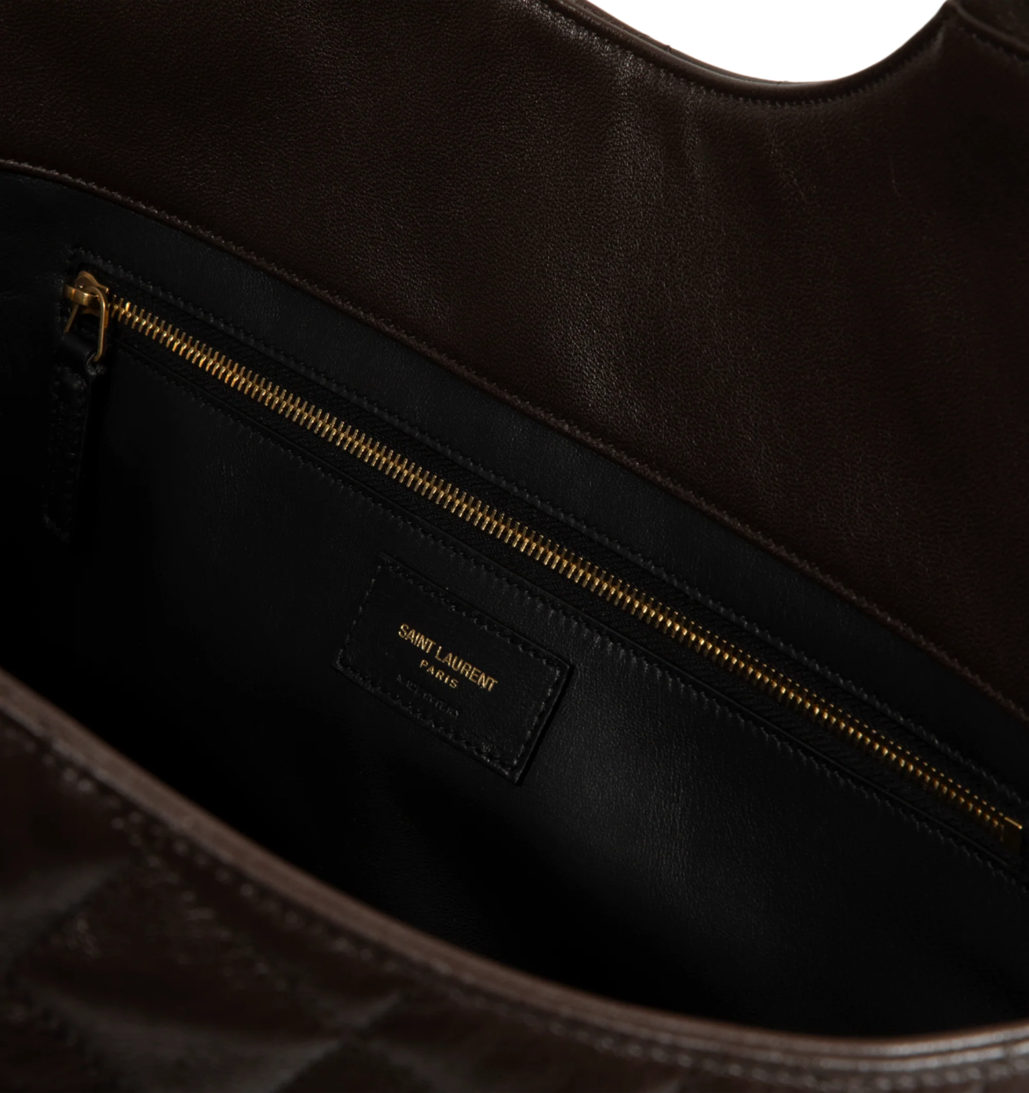 Image 3 of 3 - BROWN - Saint Laurent Womens Icare Medium Tote Bag is crafted from quilted nappa leather. Features dual top handles, open-top design, signature CASSANDRE hardware, leather lining, one removable zip pouch, and one interior zip pocket. Dimensions: 46 28 15 cm; Handle Drop: 20 cm. Main Material: Nappa Leather; Lining: Leather; Hardware: Bronze-Tone Metal. Made in Italy.