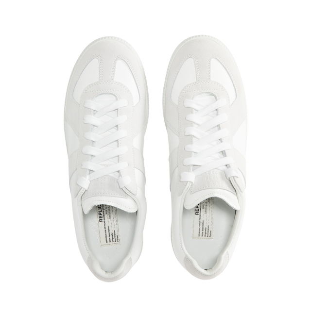 Image 5 of 5 - WHITE - MAISON MARGIELA High Quality Luxury Sneakers featuring logo label on the tab, stitching at the back, internal High Quality Luxury label, internal elastic, all-over logo insole and lace up closure. 100% calf leather. Rubber sole. Made in Italy.
