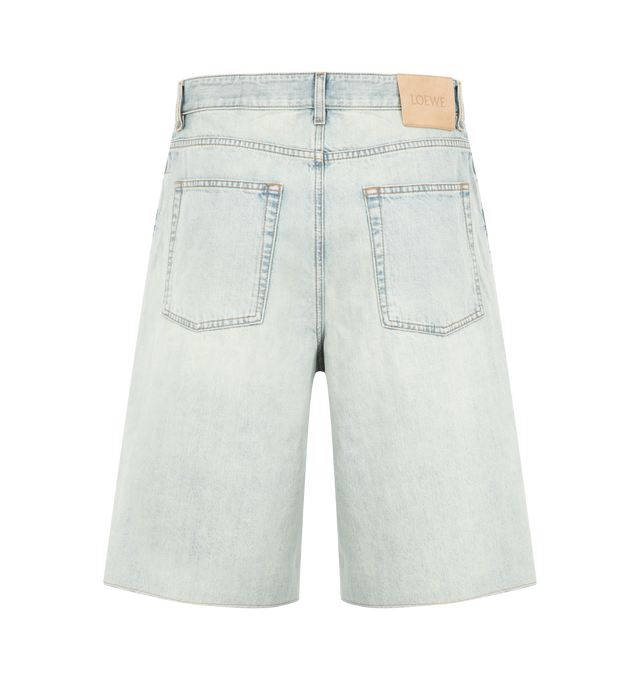 Image 2 of 3 - BLUE - Loewe Mens Washed Cotton Denim Shorts are crafted from medium-weight washed cotton denim. Features a regular fit, regular length, mid-rise waist, frayed hem, Anagram cut-outs at the knees, concealed button fly, five-pocket styling, and LOEWE debossed suede patch at the back. Main Material: Cotton. Made in Italy.