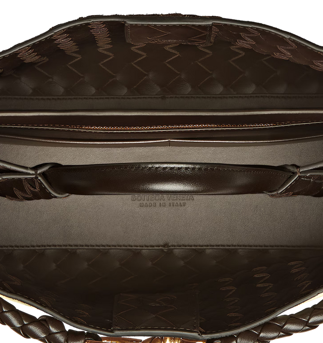 Image 4 of 4 - BROWN - BOTTEGA VENETA Medium Andiamo Bag featuring top handle bag in supple Intrecciato leather with signature knot detail and sliding cross-body strap, compartmented interior with one zippered pocket, two open pockets and magnetic closure. Lining: Lambskin bonded Intrecciato. Made in Italy.