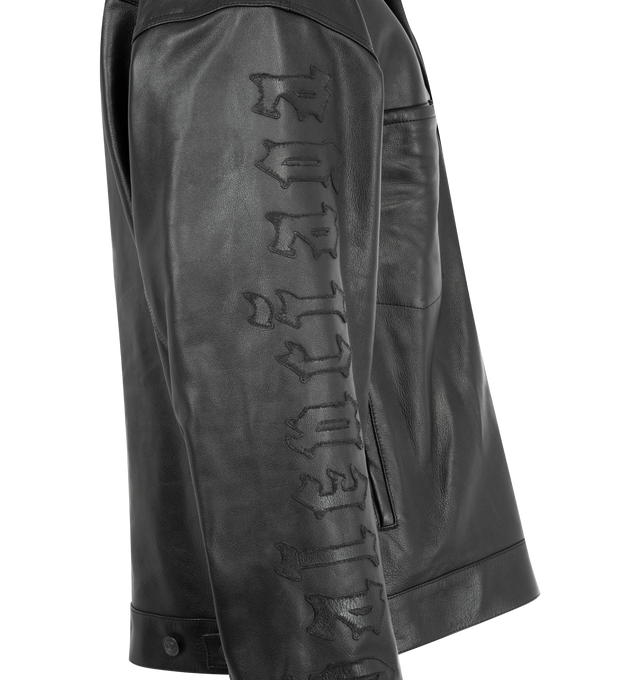 Image 3 of 3 - BLACK - BALENCIAGA Shirt Jacket featuring grainy soft buffalo skin, shirt collar, 6 button front, 2 pockets at chest, 2 slash pockets, buttoned at cuffs, adjustable buttoning at waist and gothic denim artwork embroidered on right sleeve. 100% buffalo. Lining; 100% cupro. Made in Italy.