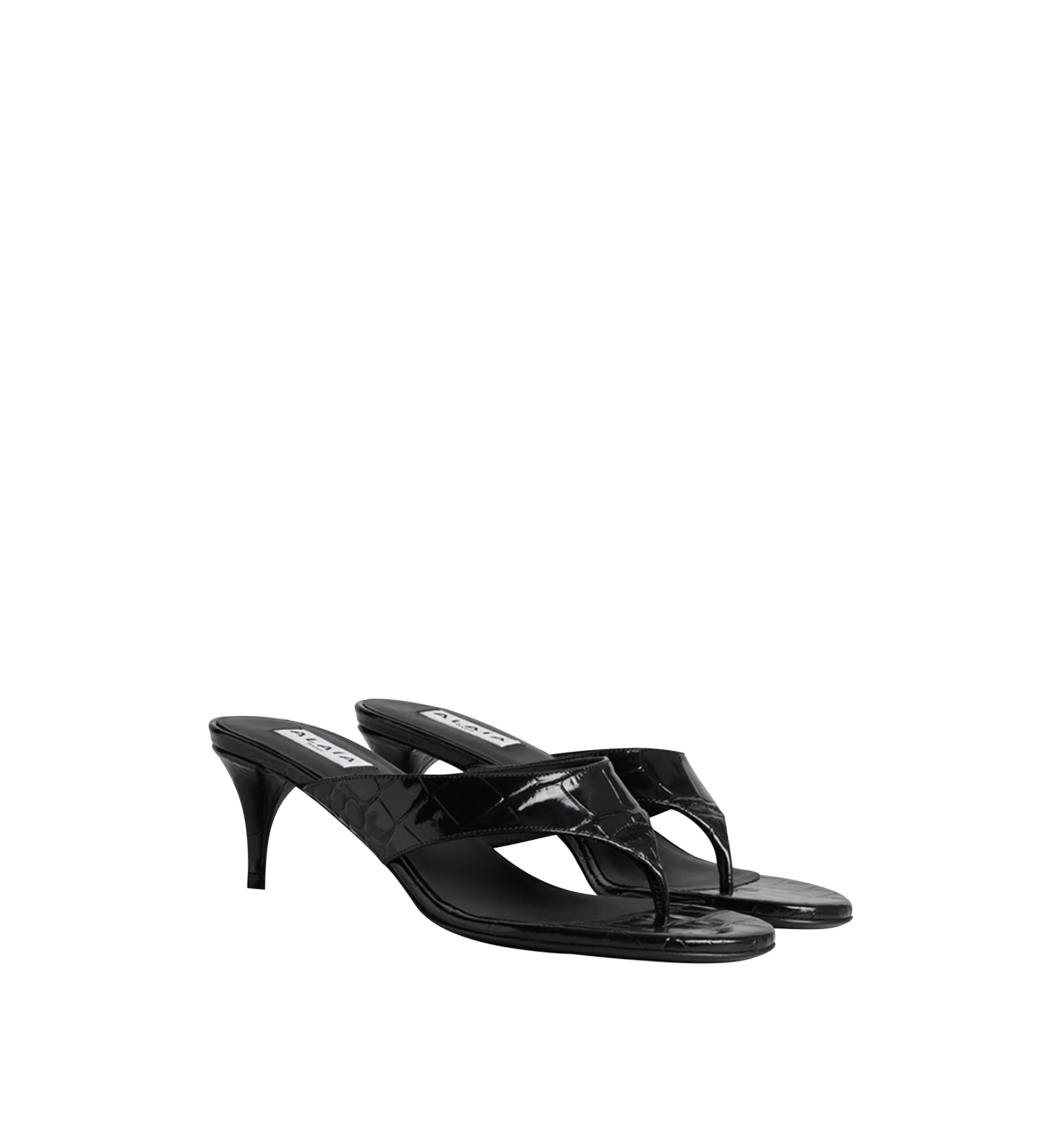 Image 1 of 1 - BLACK - Alaa Women's Crocodile-Embossed Calfskin Thong Mules are crafted from shiny cherry calfskin with a crocodile-effect finish. The slip-on silhouette features a thong design and slender stiletto heel. Upper: 100% Calf Leather. Main Lining: 100% Lamb Leather. Sole: 50% Calf Leather, 50% Rubber. Heel Height: 55 mm / 2.2 in. Made in Italy.