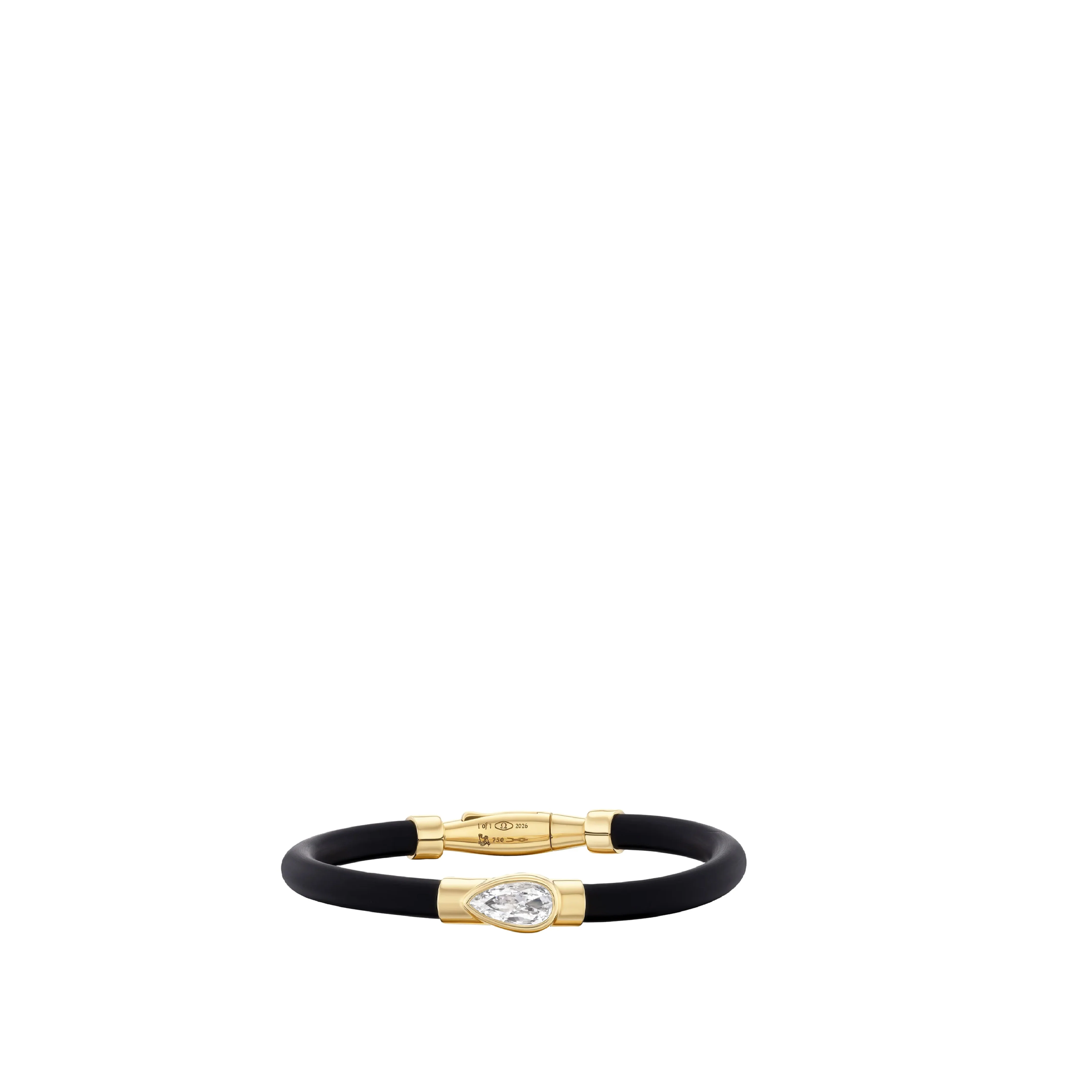 Image 1 of 3 - GOLD - Uniform Object Carbon Bracelet featuring 14 g of 18K yellow gold with a 1.01 ct pear brilliant diamond and 0.20 TCW round diamond accents. Handcrafted in New York City. Features an Italian-made hypoallergenic rubber band designed for comfort and durability. Cheap Luxury Handbag Shop offers a range of pieces from this collection in-store. For personal consultation and detailed information about jewelry, please contact our dedicated stylist team at personalshopping@hirshleifers.com.