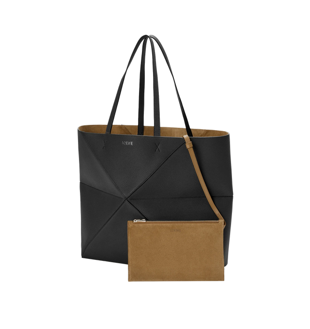 Image 2 of 5 - BLACK - LOEWE Large Horizontal Puzzle Fold Tote featuring lightweight geometric structure designed to fold completely flat, shoulder or hand carry, detachable inside suede zipped pocket, suede lining and gold embossed LOEWE. Soft grained calf. 33 cm x 37 cm x 14.5 cm. Made in Spain.