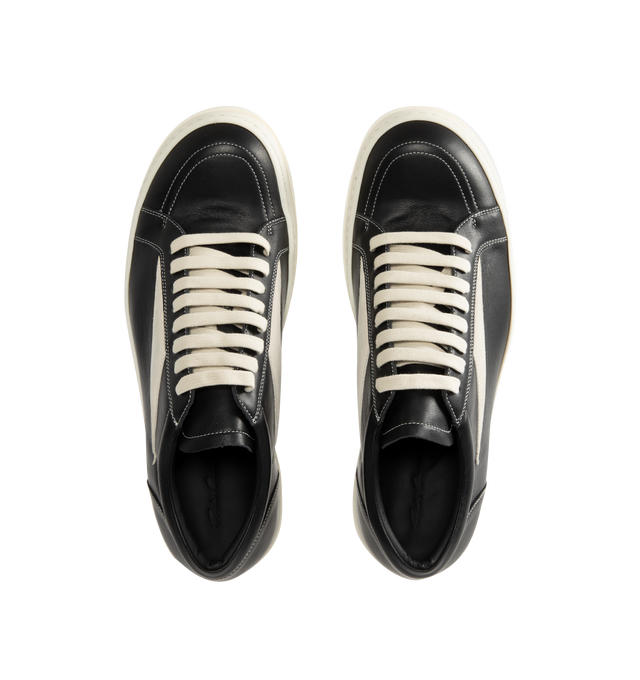 Image 5 of 5 - BLACK - Rick Owens Mens Vintage Sneakers feature a full-grain calf leather and suede upper. Designed with an under-ankle silhouette, eight-eyelet lace-up closure, toe cap, resized triangular leather side appliqu, padded ankle, contrast stitching, and shark-tooth thermoplastic rubber outsole. Upper: 100% Cow Leather; Lateral Details: 100% Calf Leather; Lining: 100% Calf Leather; Insole: 100% Calf Leather; Outsole: 100% Thermoplastic Rubber. Sole Height: 3.5 cm. Made in Italy. 