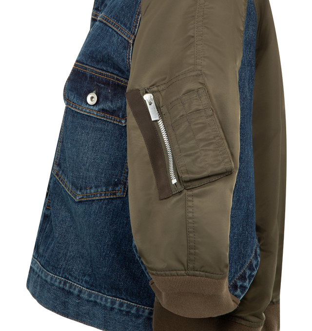 Image 3 of 3 - BLUE - SACAI Denim Nylon Mixed Media Jacket featuring an indigo-dyed denim front contrasted by puffer-inspired nylon back paneling, front button closure, spread collar, three-quarter sleeves, chest button-flap patch pockets and sleeve zip pocket. 100% cotton. 100% nylon, 55% polyester, 44% cotton, 1% polyurethane. Made in Japan.