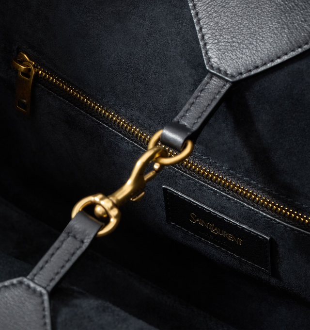 Image 3 of 3 - BLACK - SAINT LAURENT Y Small Tote in leather featuring small version of the Y tote in finely grained leather, ultra-lightweight bag, subtle Y signature stitching, lined in tonal suede, zip pocket, hook closure, one zip pocket and one keyring carabiner tab. 11.4" x 9.4" x 6.5". Calfskin. Made in Italy. 