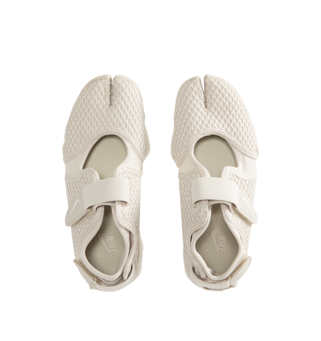 Image 5 of 5 - WHITE - NIKE Air Rift Shoe featuring mixed textile upper, hook-and-loop straps, Nike Air unit in the heel, foam midsole and rubber detailing on the outsole with rugged tread. 