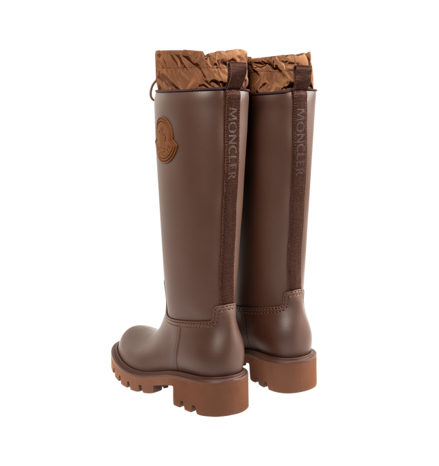 Image 3 of 4 - BROWN - MONCLER Kickstream High Rain Boots featuring PVC and nylon upper, fabric insole, TPU welt, EVA tread, drawstring fastening and waterproof. Calf height 35 cm. Sole height 4 cm. 100% polyvinyl chloride. Lining: 80% polyamide/nylon, 20% elastane/spandex. Sole: 100% elastodiene. Made in Italy.