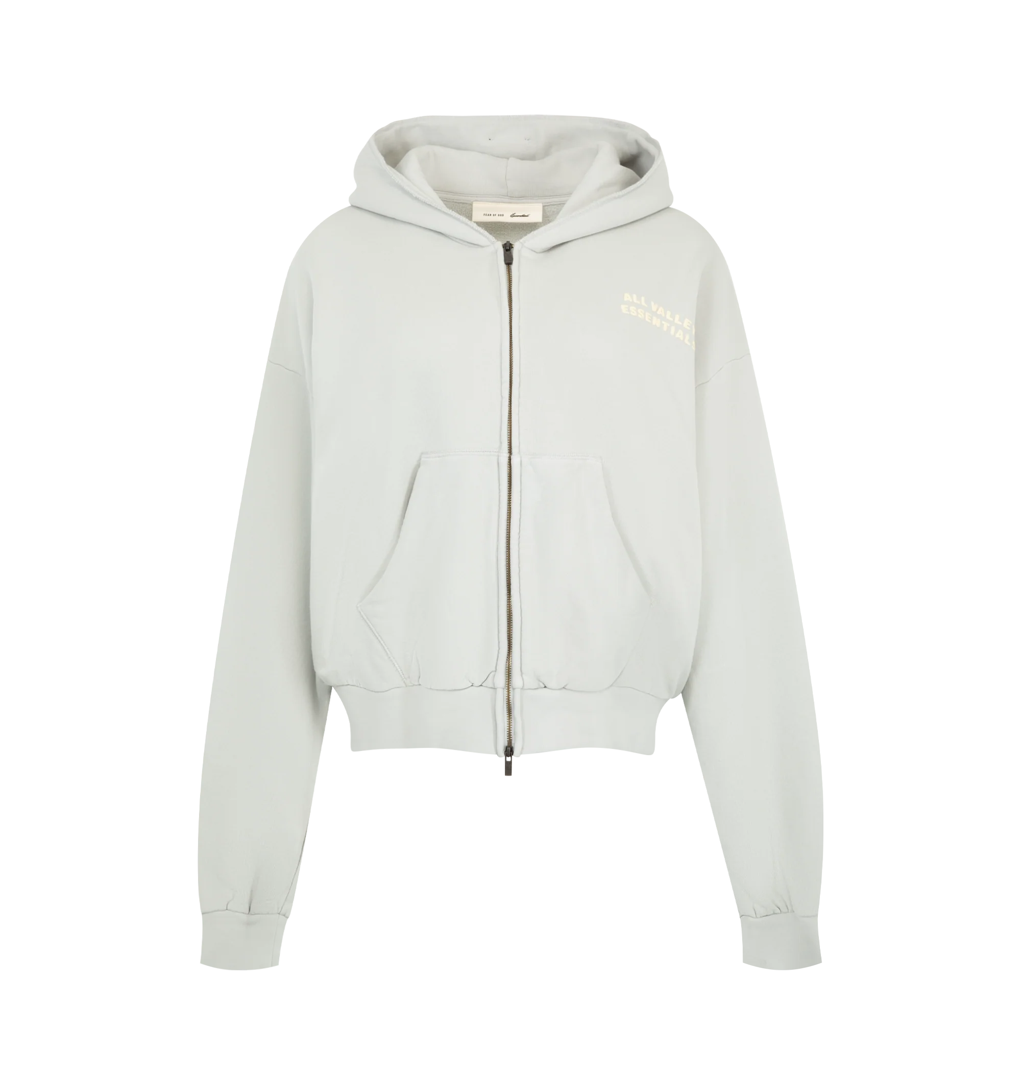 Image 1 of 2 - GREY - Fear of God Essentials Womens 90s Full Zip Hoodie is crafted from heavyweight 390 GSM cotton fleece with a pigment-dyed finish. Features a relaxed cropped fit, full-zip closure, dropped shoulders, rib-knit cuffs and hem, kangaroo pocket, contrasting stitching, puff-printed front graphic, back graphic, and Essentials label at the hood. Main Material: 100% Cotton. Imported