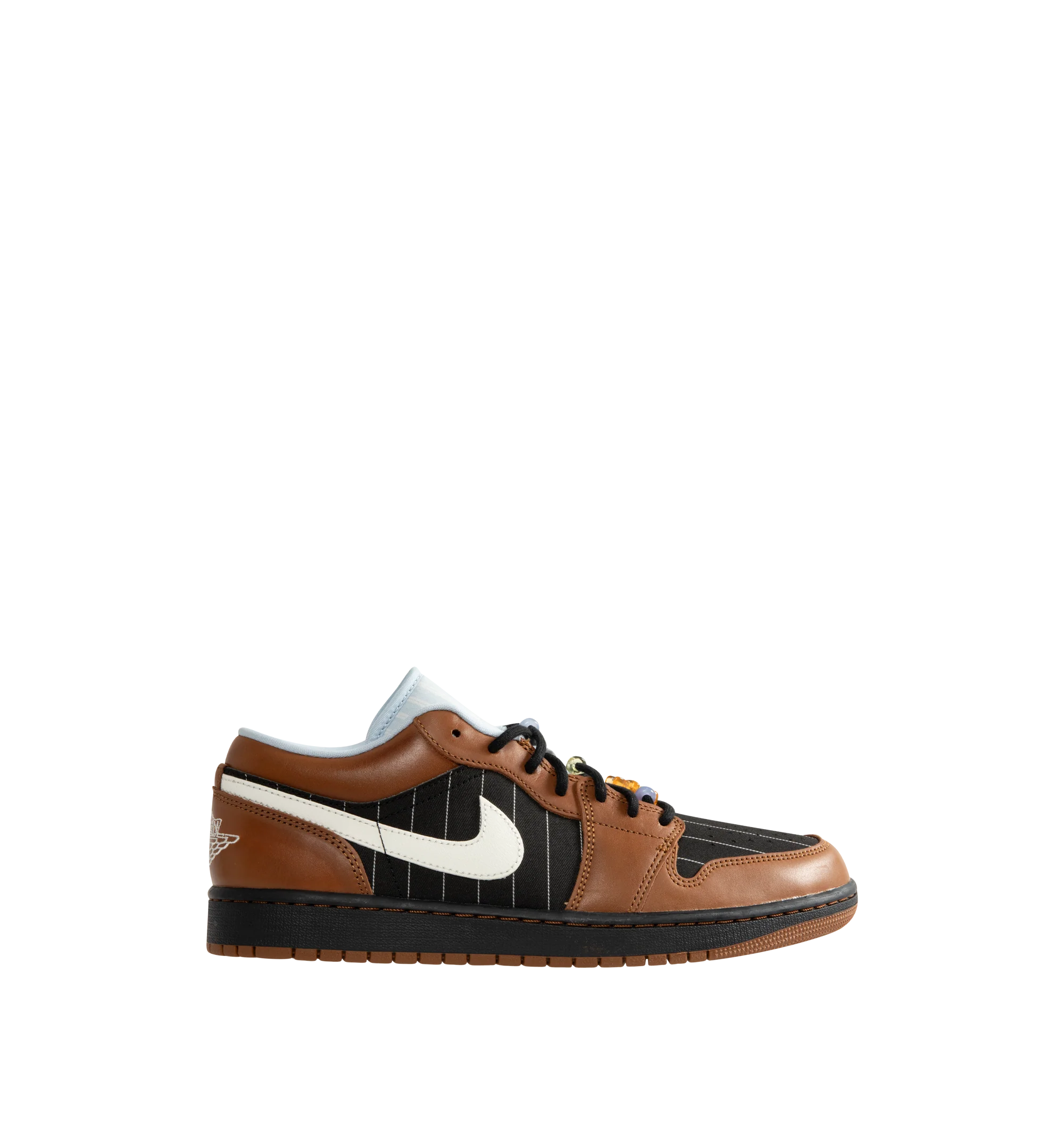 Image 1 of 5 - BROWN - Men's Air Jordan 1 Low SE Sneakers feature a genuine leather and suede upper with the iconic low-top silhouette, signature Wings branding, and a Jumpman logo for a premium take on a timeless classic. These lifestyle sneakers combine encapsulated Air-Sole cushioning with a durable rubber outsole for lightweight comfort, lasting support, and reliable everyday traction. Main Material: Genuine Leather and Suede. Midsole: Encapsulated Air-Sole Unit. Sole: Rubber.