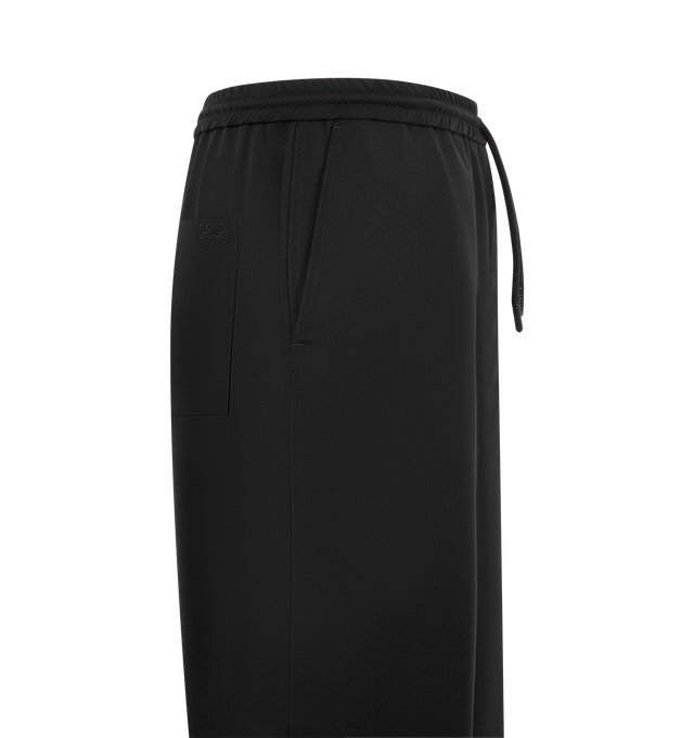 Image 3 of 3 - BLACK - Loewe Mens Drawstring Trousers are crafted from lightweight wool. Features a relaxed fit, regular length, mid-rise waist, straight leg, concealed button fly, slash pockets, rear patch pocket, and Double L embroidery at the back pocket. Main Material: Cotton. Made in Italy.