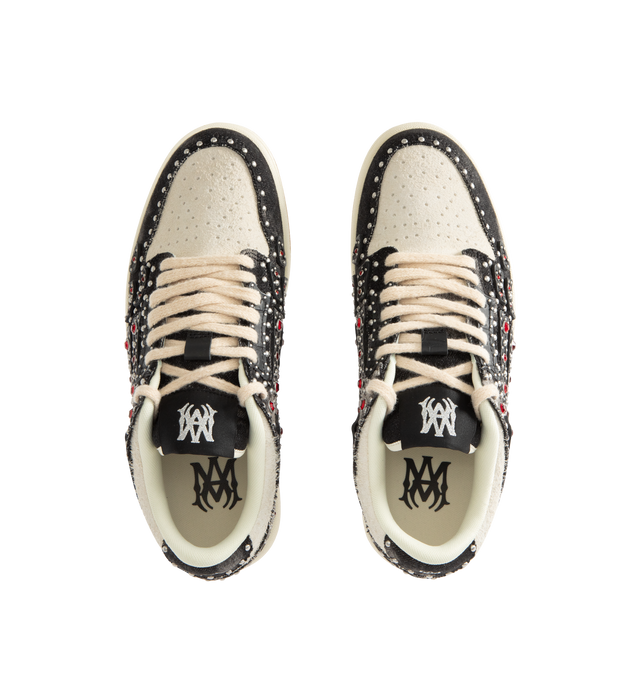 Image 5 of 5 - BLACK - AMIRI Stud Skel Top Low Sneaker featuring bone appliques, stud detailing, two-tone rubber sole with an upper paneled with washed denim and textured suede. 95% cotton, 5% polyester. Sole: rubber.