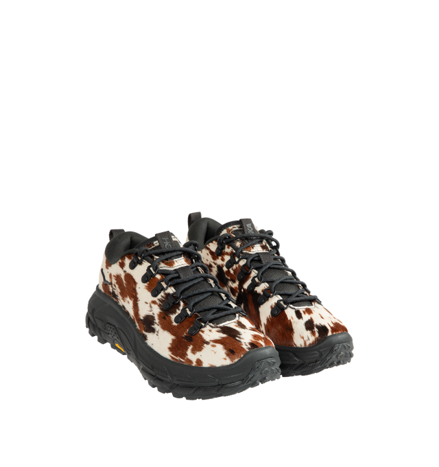 Image 2 of 5 - BROWN - HOKA Tor Summit+ Pony Hair Sneaker featuring pony hair leather upper, metal eyelets + hiking-style lacing system, Vibram Megagrip outsole for traction on varied terrain, cushioned midsole for long-wear comfort, pull tabs at heel and tongue for easy entry and ;ow-cut hiking silhouette.
