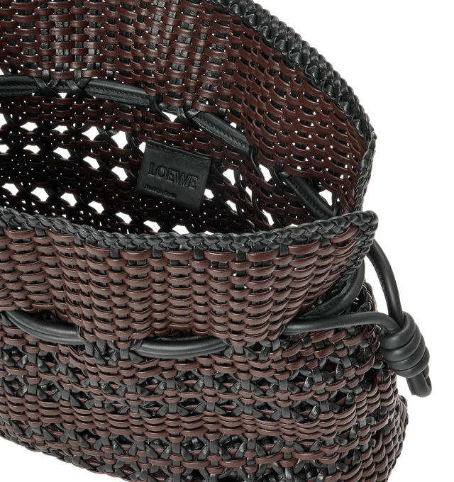Image 4 of 4 - BROWN - LOEWE Medium Flamenco Clutch in woven nappa calfskin featuring a soft and slouchy bag with a cinched closure, knot drawstrings, crafted in two-tone hand-woven nappa calfskin, shoulder, crossbody or hand carry, detachable and adjustable strap, magnetic closure and unlined. Woven nappa. 24.5 cm x 30 cm x 10.5 cm. Made in Spain.