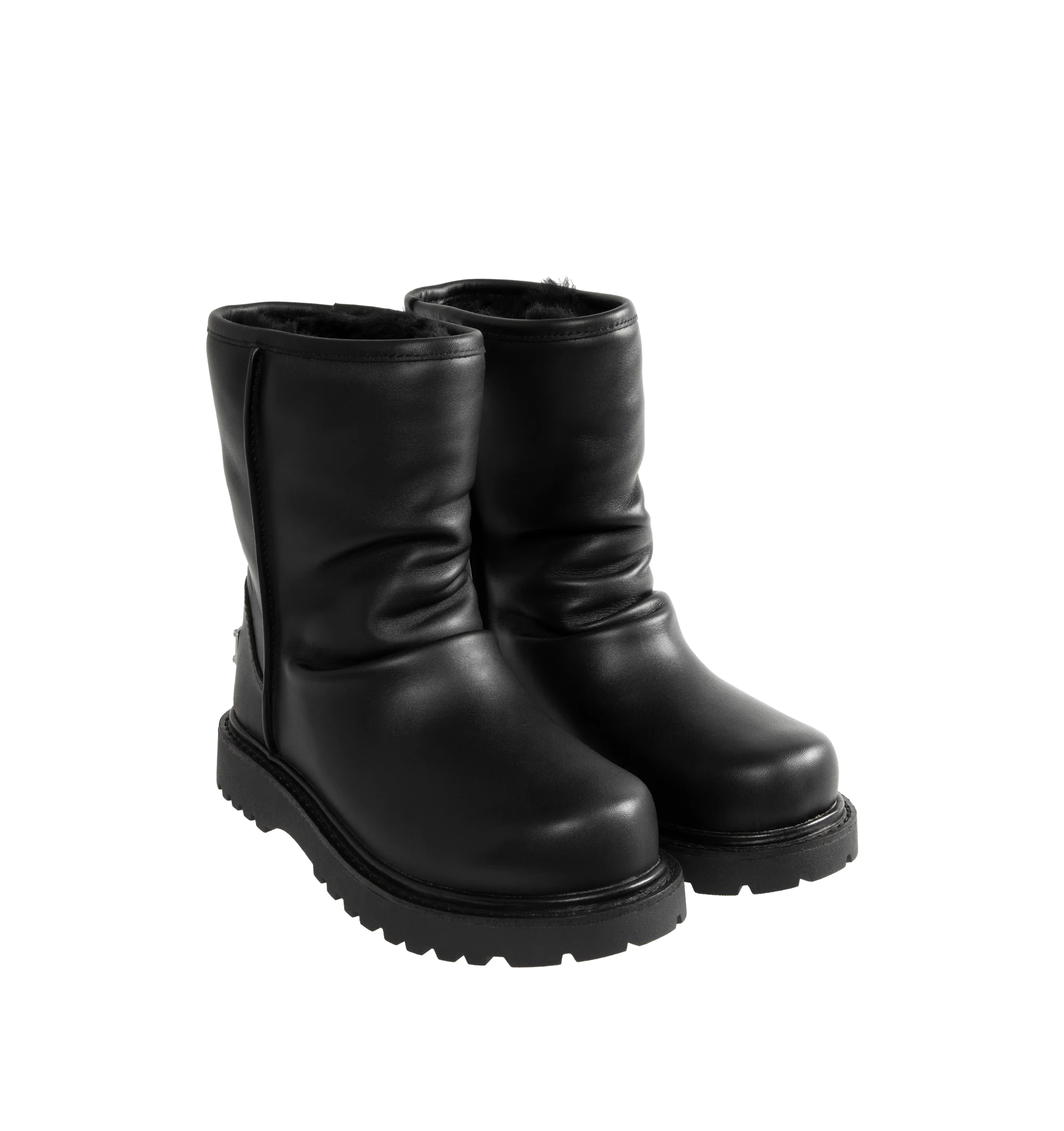 Image 2 of 4 - BLACK - UGG x Willy Chavarria Relaxed Boot is crafted from leather and features a mid-calf silhouette inspired by classic motorcycle boots. Designed as a slouchier interpretation of the biker boot, it is detailed with custom chrome logo hardware, a draped black leather upper, and a soft sheepskin-lined interior that combines rugged styling with signature comfort. Main Material: Leather. Lining: Sheepskin. Unisex style in men's sizes.