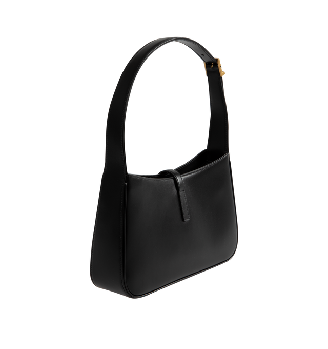 Image 2 of 3 - BLACK - SAINT LAURENT LE 5  7 leather shoulder bag featuring gold hardware, leather tab with THE CASSANDRE, and tonal suede lining. Compact and SPACIOUS, it features an interior zipped pocket and adjustable shoulder strap. Dimensions: 9 x 6.2 x 2.5 inches with 7.8 inch strap drop. Calfskin leather. Made in Italy. 