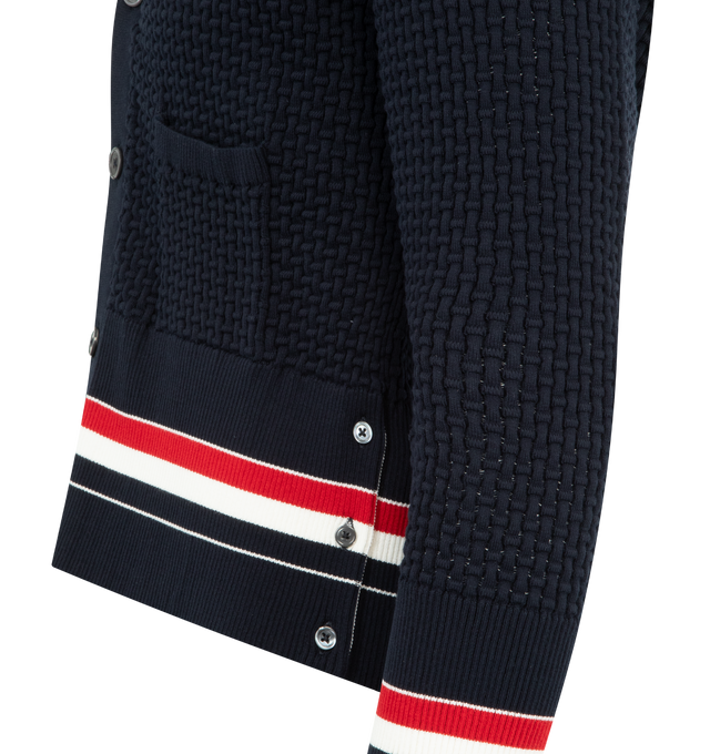 Image 3 of 3 - NAVY - THOM BROWNE Float Ripple Stitch Cardigan featuring high-twist cotton with a float ripple stitch, V neckline, front button closure with RWB grosgrain placket, patch hand pockets with ribbed trim, buttoned cuffs and side vents with RWB grosgrain trim, engineered RWB detailing and signature striped grosgrain loop tab. 100% cotton. Made in Italy. 