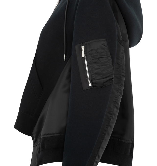 Image 3 of 3 - BLACK - SACAI Sponge Sweat x Nylon Twill Hoodie featuring a cotton-blend jersey bodice, zip-up design, technical sleeve-like details, two-way zipped front, kangaroo pocket and drawstring hood. 62% cotton, 38% polyester. 100% nylon. 100% cotton. Made in Japan.   