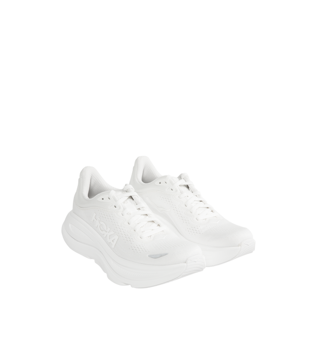 Image 2 of 5 - WHITE - HOKA W Bondi 9 Sneaker featuring performance mesh upper, cushioned collar and tongue, removable contoured insole, supportive midsole, textile lining, lace-up closure, round toe and rubber sole.
