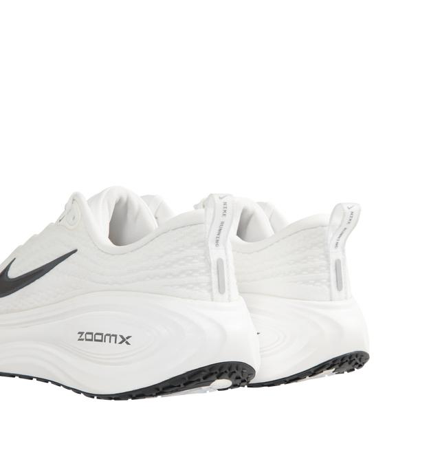 Image 3 of 5 - WHITE - NIKE Vomero Plus Sneaker featuring ultra-responsive ZoomX foam midsole, engineered mesh upper, high-abrasion rubber outsole, webbed lace loops for an adjustable fit and reflective details. 