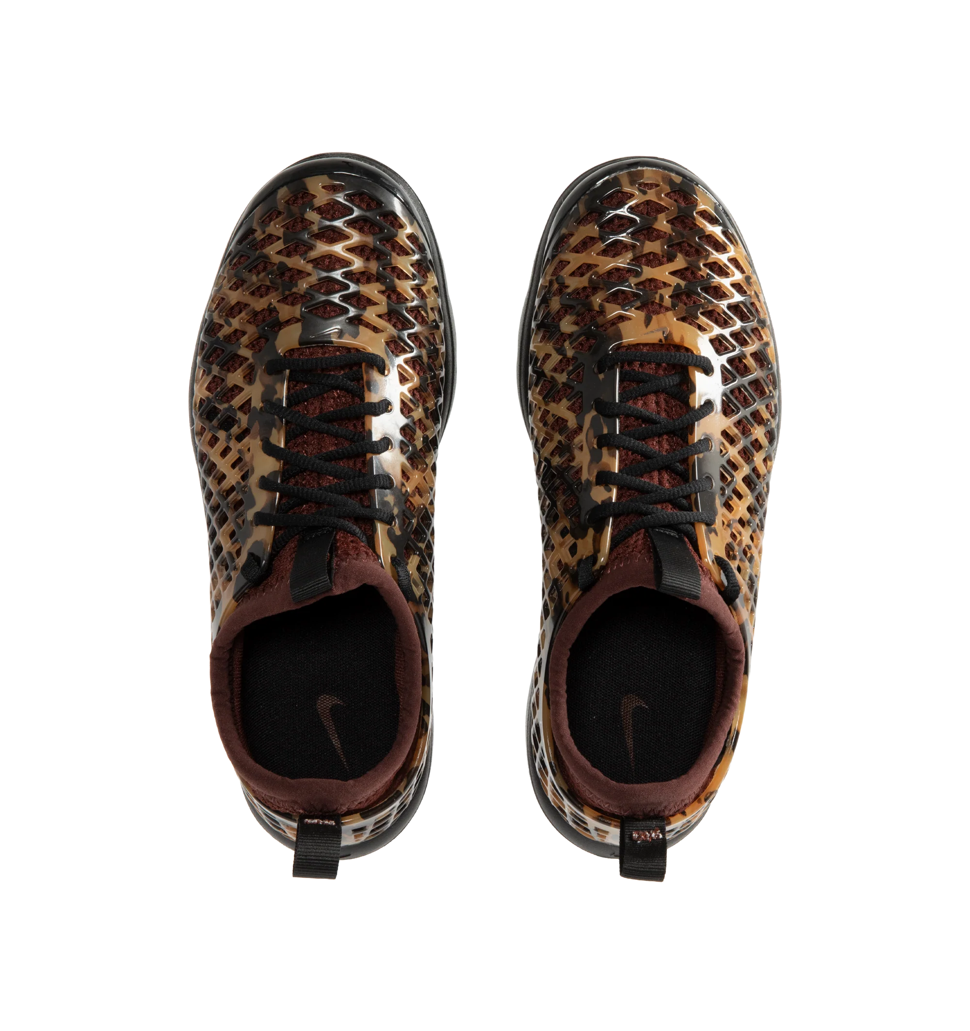 Image 5 of 6 - BROWN - Nike Women's Rejuven8 Run Sneakers feature a black and brown tortoise shell-patterned synthetic upper with a removable mesh bootie and lightly padded collar. Flat laces, heel and tongue pull tabs, a mini Swoosh at the back heel, and Swoosh branding on the sole unit complete the design. ReactX foam provides responsive cushioning, while a rubber outsole offers durable traction. Upper: Synthetic. Bootie: Mesh. Midsole: ReactX Foam. Sole: Rubber. 