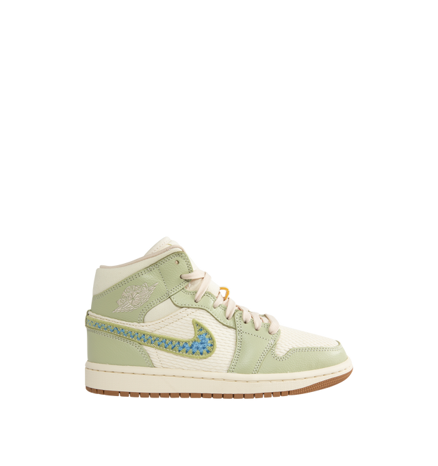 Image 1 of 5 - GREEN - JORDAN Air Jordan 1 Mid SE Sneaker featuring knitted textiles and crocheted charm, leather in the upper, encapsulated Nike Air-Sole unit, rubber in the outsole and mid-cut collar.