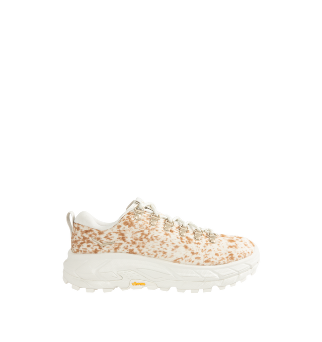 Image 1 of 5 - WHITE - HOKA Tor Summit+ Pony Hair Sneaker featuring pony hair leather upper, metal eyelets + hiking-style lacing system, Vibram Megagrip outsole for traction on varied terrain, cushioned midsole for long-wear comfort, pull tabs at heel and tongue for easy entry and ;ow-cut hiking silhouette.
