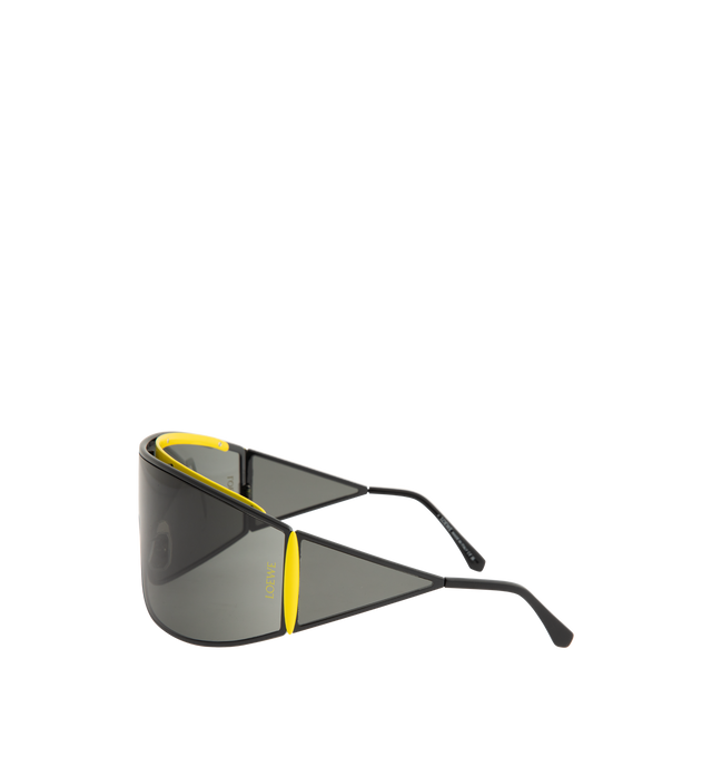 Image 2 of 3 - BLACK - LOEWE Speed Shield Sunglasses featuring shield-shape in a wraparound metal construction with a lens that extends into a distinctive triangle-shaped temple, complemented by contrast trim, universal fit, UVA/UVB protection and engraved LOEWE. Metal. Temple size: 12 cm. Made in Italy.