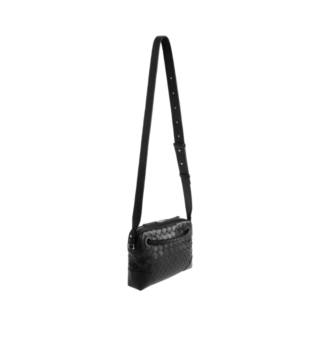 Image 2 of 3 - BLACK - BOTTEGA VENETA Intrecciato Messenger Bag featuring intrecciato leather small messenger with adjustable cross-body strap, zip closure and back exterior pocket. Calfskin. Lining: canvas. Made in Italy.